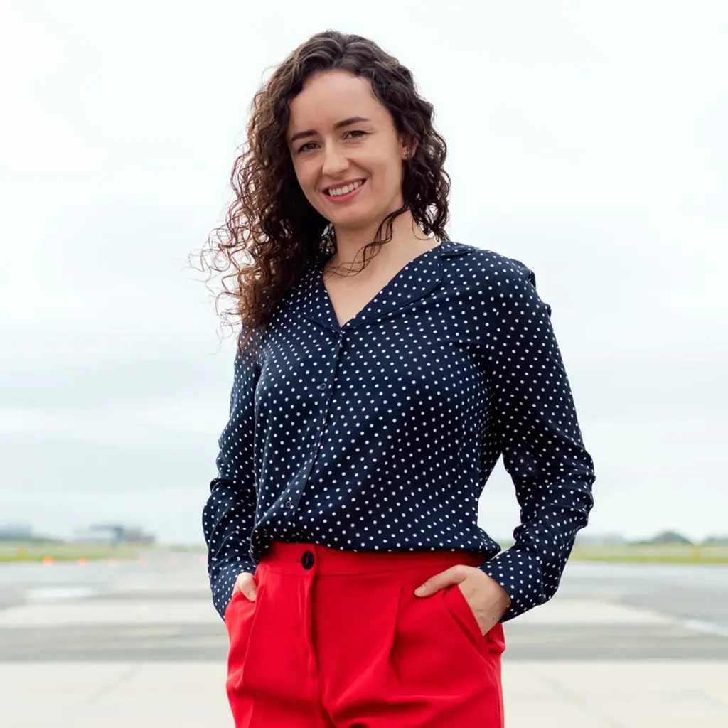 Portrait of a woman with dark curly hair